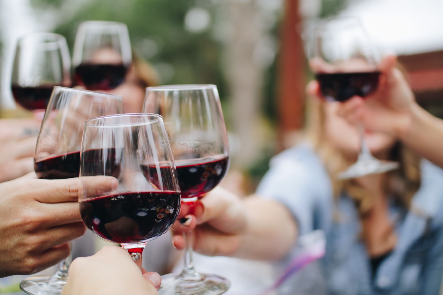 women drinking red wine at a north myrtle beach winery