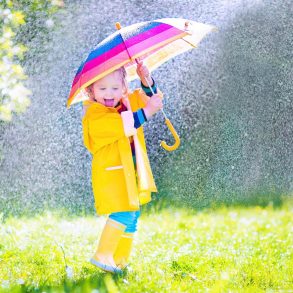 child playing outside and enjoying one of the best rainy day activities in North Myrtle Beach
