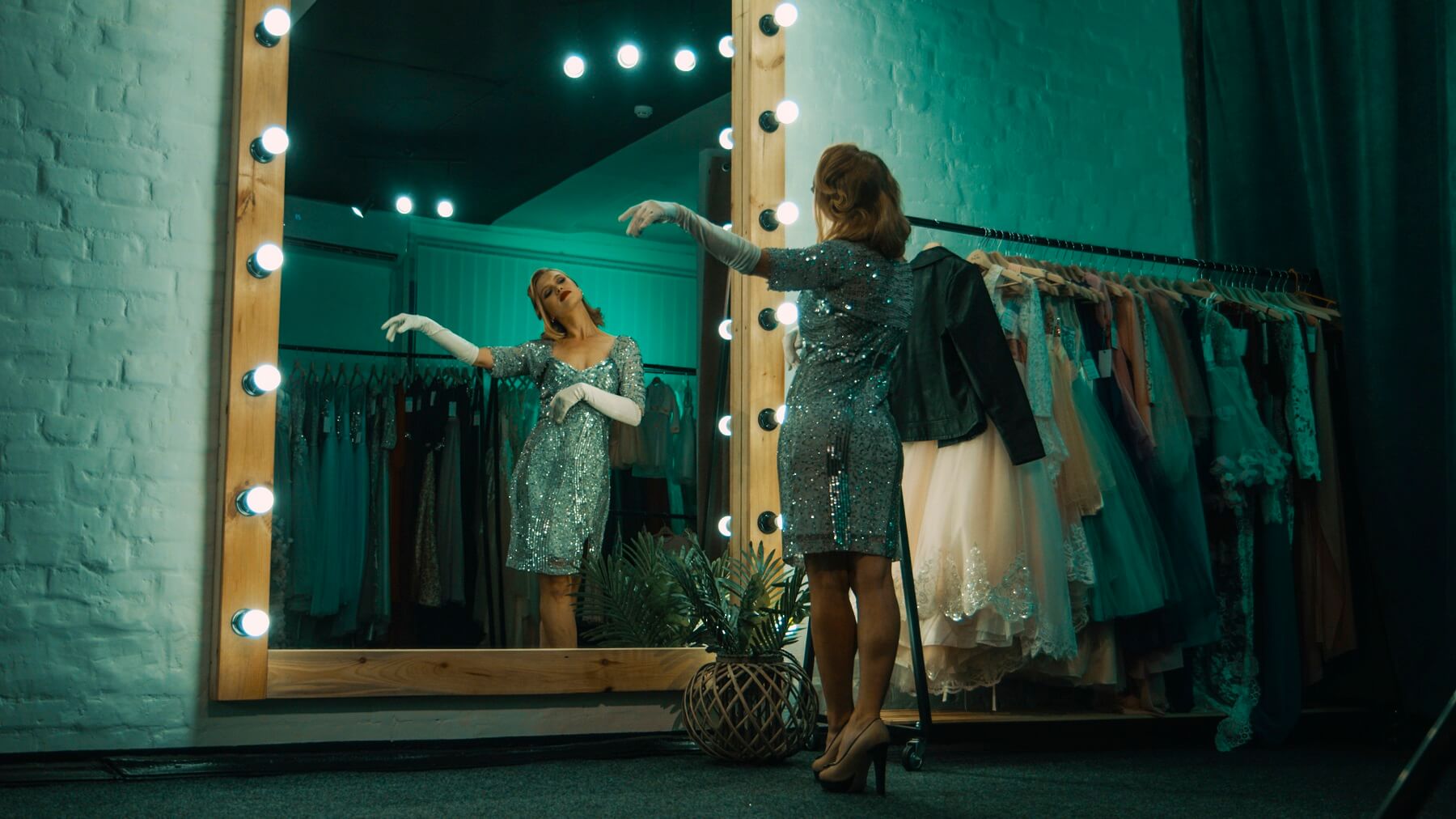 performer practicing in front of mirror