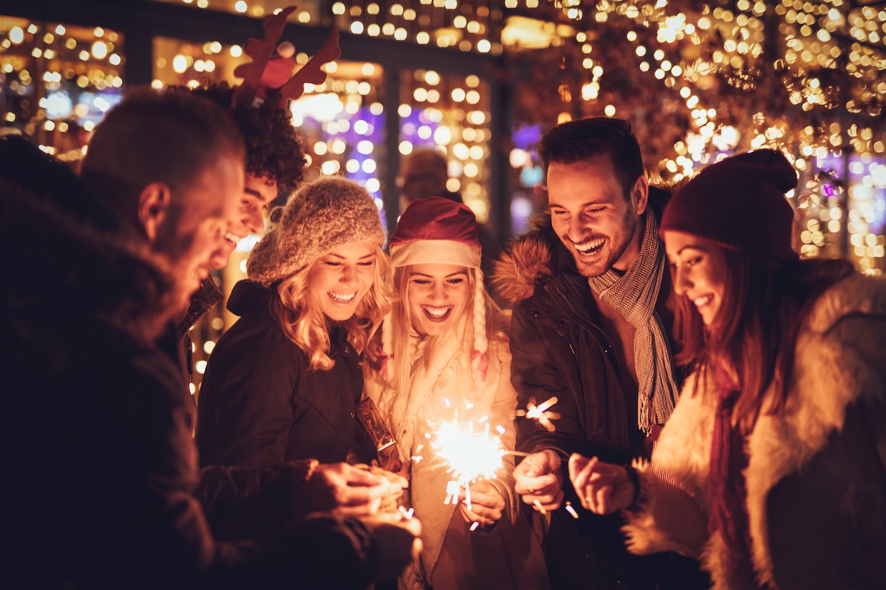 Friends With Sparklers At The New Year Party