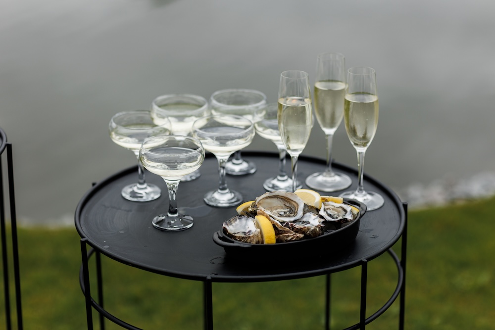 Oysters on a nice tray near the water