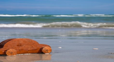 Wooden toy car on Myrtle Beach