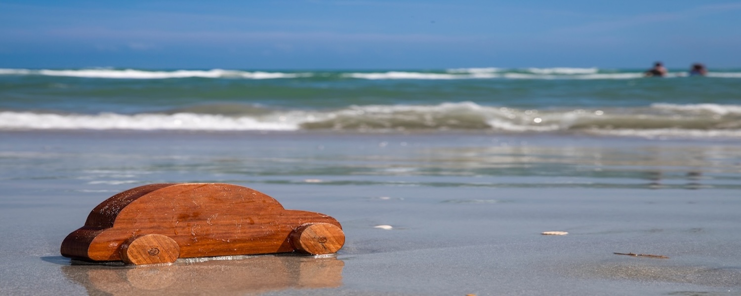 Wooden toy car on Myrtle Beach