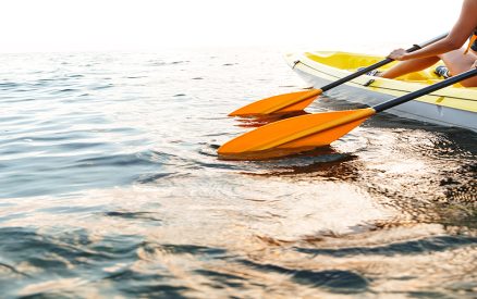 Cropped image of a young couple kayaking