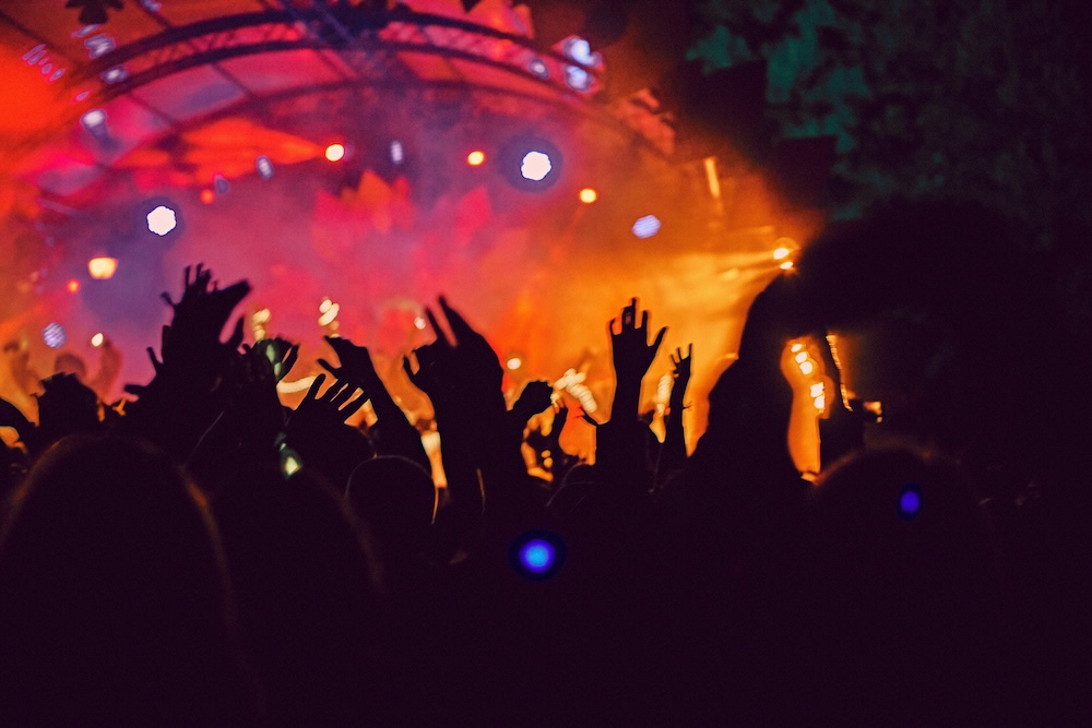 Abstract blur atmosphere: happy people enjoying outdoor music festival concert, raised up hands and clapping of pleasure, active night life concept, play of light and shadow on the huge stage SSUCv3H4sIAAAAAAAACnRRy07DMBC8I/EPkc+NlKQmTXuDOxL3isPG3iZWXbvyA4Sq/jt2HIMPcPPOrGdndm+PD1VFRrCCkUN1i1WohZTeOgNOaBXgZrPiBhVHUyLIhdNGgCzBERybFVwwgMpLGeH7QhLrwHmLNg5bIQYOp6CRwB+J5OiY6ioTCxl+BIo8j9Ejc2RTcNaPkXsBdp6M9opbktk07x+xN9RXiX9JvQrLUEpQqH0hlh7vOTNMqNjXEquIa1AipLjH1ErOnw7NpVwAeC50kf1DM5CxYVsoXY1gQk3FN+3m5Rb5GwtpnYkWSI5BpNZXGEOuQ3UKmpjxGayNy8l4MYiFy+tLMUdptwRYVQkP94plu+1oPzQdHdr+ad8Mfbc2pBvPIugsdrJQqNlZhIP8QiI6IGPb4EDbXY1d39V0z3b10O1ovT1R2vB26DmnYfH3bwAAAP//AwB7zWBSrQIAAA==