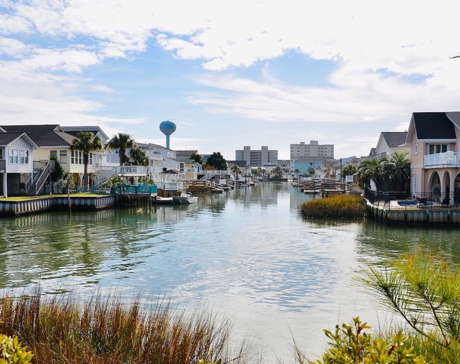 Waterfront homes with balconies and docks. Beautiful winter view in North Myrtle Beach, South Carolina, an attractive place for retirement.